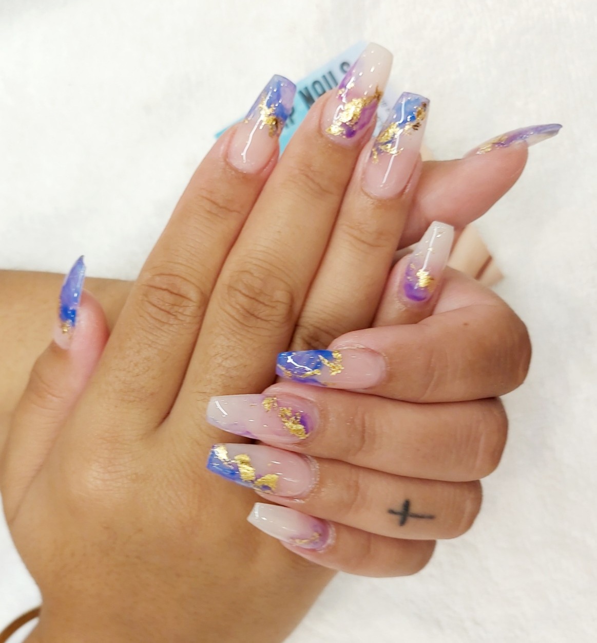 Blue and purple marble nails with gold foil